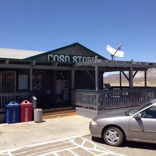 a car parked in front of the store
