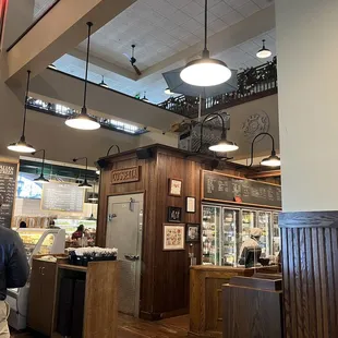 Cafeteria-style.  First is the salads/sandwich, then pasta, ending in pizza.  Registers in the center, pay before you sit down and eat.