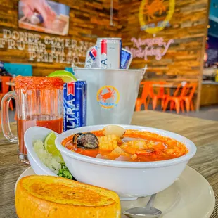 a bowl of soup and a slice of bread
