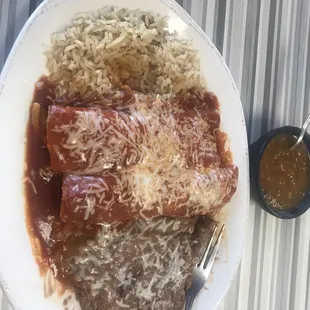 Chicken enchiladas special... Can&apos;t beat the price for the amazing plate