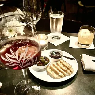 Complimentary olive plate to have with cocktails. The Sangria is a unique blend that delights and refreshed the mouth.