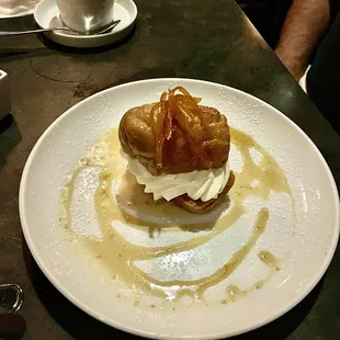 We shared a dessert - Baba au Rhum - a divine cake cake soaked in an orange butter sauce with whipped cream and orange peel garnish.