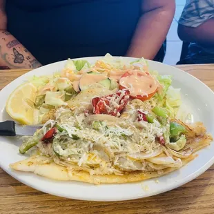 Filete à la casa - Homestyle fish with bell peppers &amp; onions in a butter sauce.  No rice or beans, replaced with Ensalada (salad).