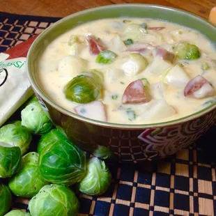 a bowl of soup and brussels sprouts