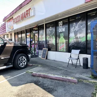 a car parked in front of the store