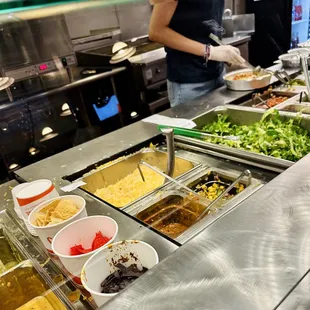a man preparing food in a restaurant kitchen
