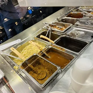 a buffet with many different types of food
