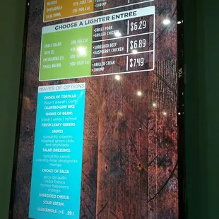 a menu displayed on a large screen