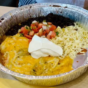a plate of mexican food with rice and beans