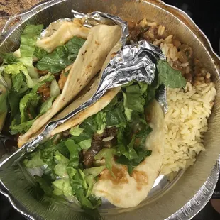 Steak and raspberry chicken taco and rice and pinto beans