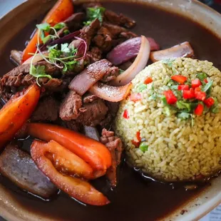 Lomo Saltado (can be made gluten free with white rice)