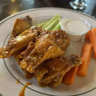 Various appetizers (tater skins, buffalo wings, and redneck nachos) from #Costellos