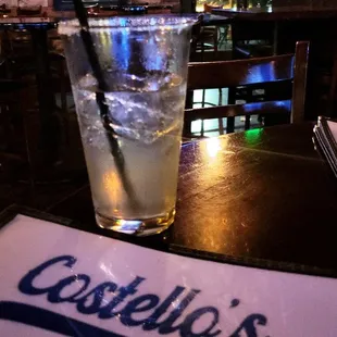 a drink in a glass on a table