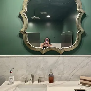 Clean ladies restroom with both hand soap and hand sanitizer!