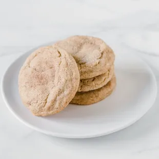 three cookies on a white plate