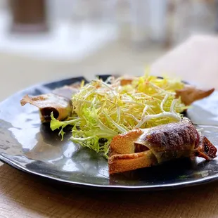 Bonbons de Foie Gras: Foie gras &amp; medjool dates, crispy brick pastry, piment d&apos;espelette, frisée salad | 3 pc-$10
