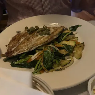 Pompano on bed of spinach