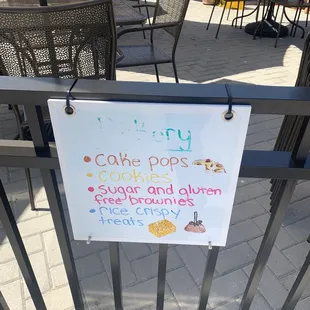 a sign on a fence