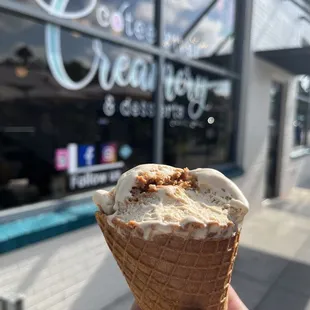 Biscoff Cookie Butter ice cream in a homemade waffle cone. Several bites in :)