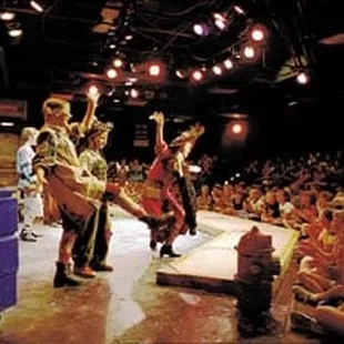 Audience members sit close to the stage at the Coterie Theatre in Kansas City