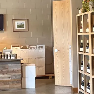 a wine shop with shelves of wine