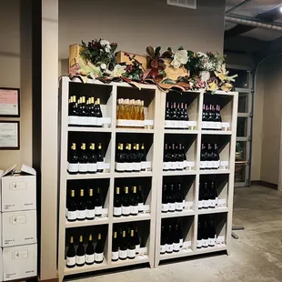 a wine rack with bottles of wine