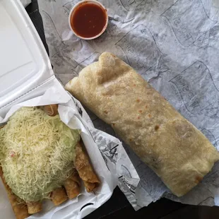 Beef rolled tacos with guacamole and cheese and California burrito.