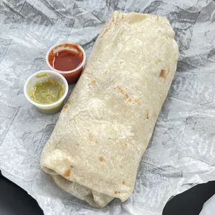 Bacon breakfast burrito with beans. Very big. Bacon was soft and chewy - wish it would have been crispier. Both salsas are good.