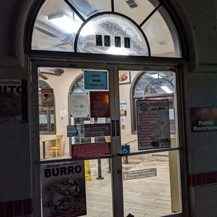 the entrance to a restaurant