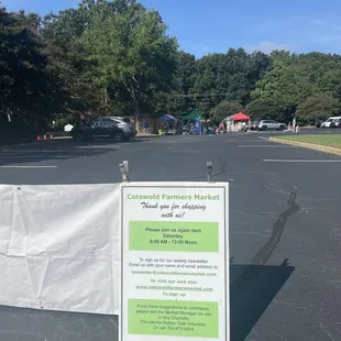 a sign in a parking lot