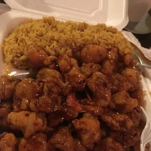 Orange chicken dinner with fried rice plus shrimp egg roll