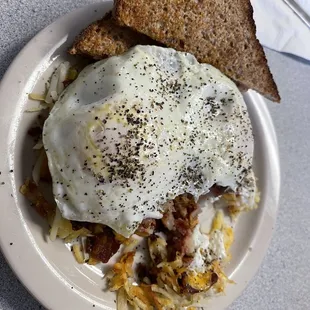Corned beef hash and over easy eggs