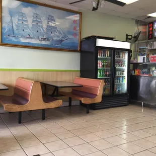 a table and chairs in a restaurant