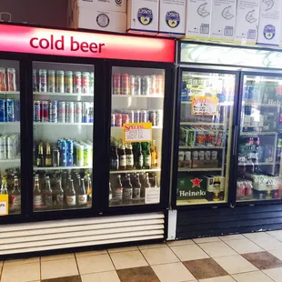 a cold beer display in a store