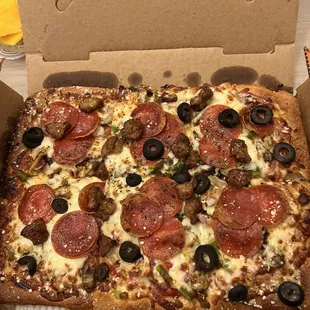 pepperoni, olives, and cheese
