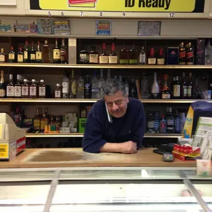 a man sitting at a counter
