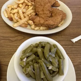 Chicken, tender dinner with green beans and french fries
