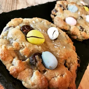 a chocolate chip cookie with candy eggs