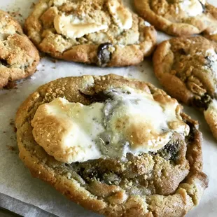 a tray of cookies with marshmallows