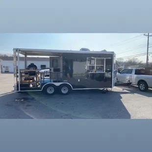 Food trailer in parking lot of rians fatted calf