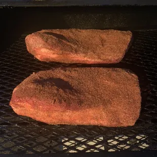 Briskets hitting the smoker