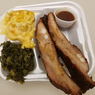 2 big Pork Ribs with Collard greens and Macaroni and cheese. STUPENDOUS!