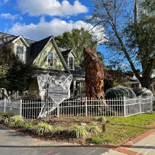 a house with a white picketer fence