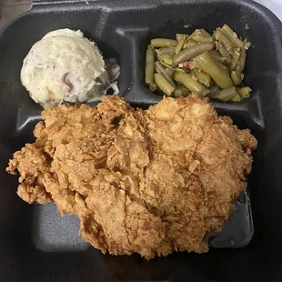 Chicken fried chicken plate with garlic potatoes and Southern Green Beans