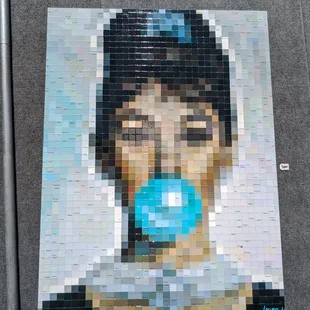 Have you seen this type art. Basically glass tiles, blurry until you look at it with your phone