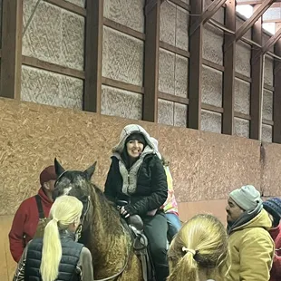 Can't fake that smile -- first time to ride a horse