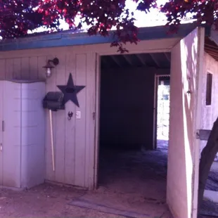 Individual horse stall / barn attached to paddock.