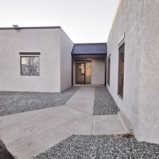 Off ic entrance in back