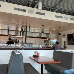 Counter seating in front of grill