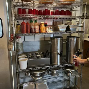 Water, silverware, and condiment station